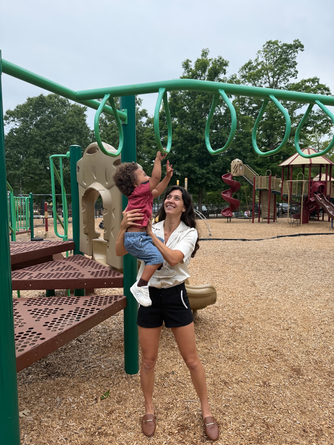 Fayth with her son at the playground